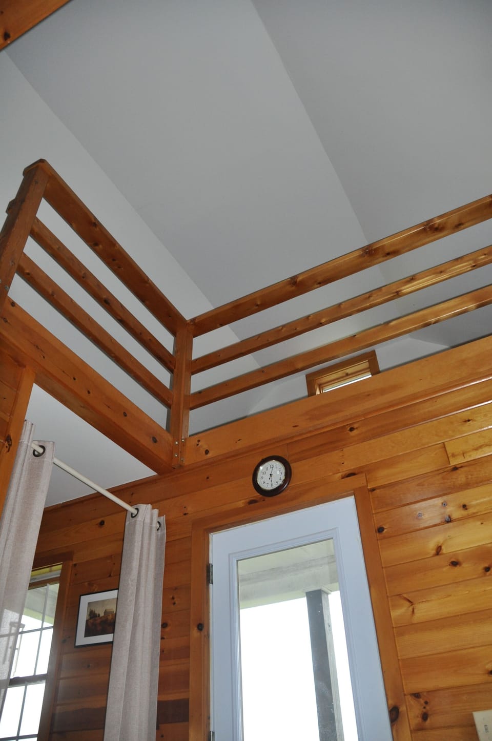 The main room soars to the open loft
