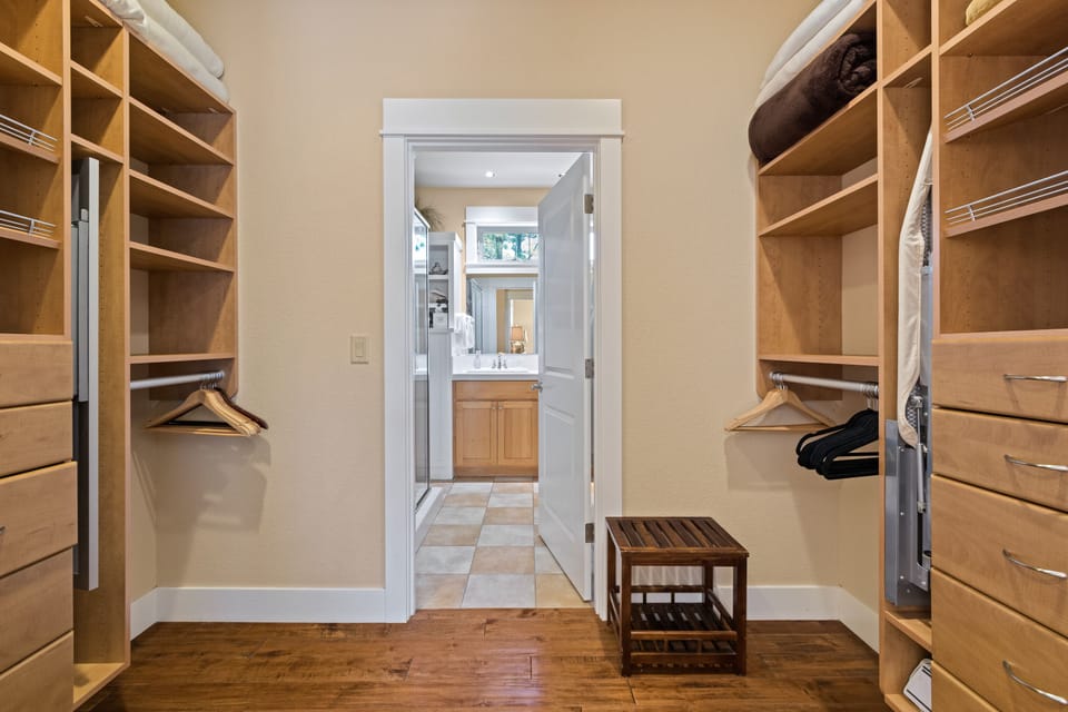 Huge walk in closet, complete with a mirror and ironing board that pull out.