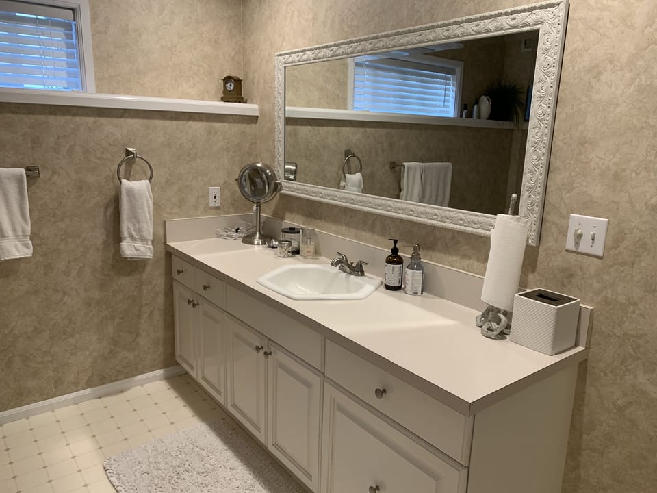Large bathroom with tub/shower