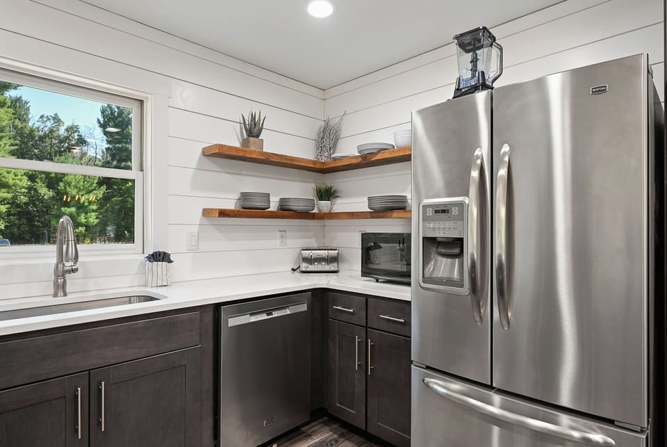 Large refrigerator with ice maker. 