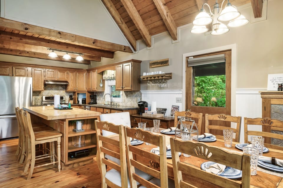 Seating for 8 at the table and 3 at the kitchen island