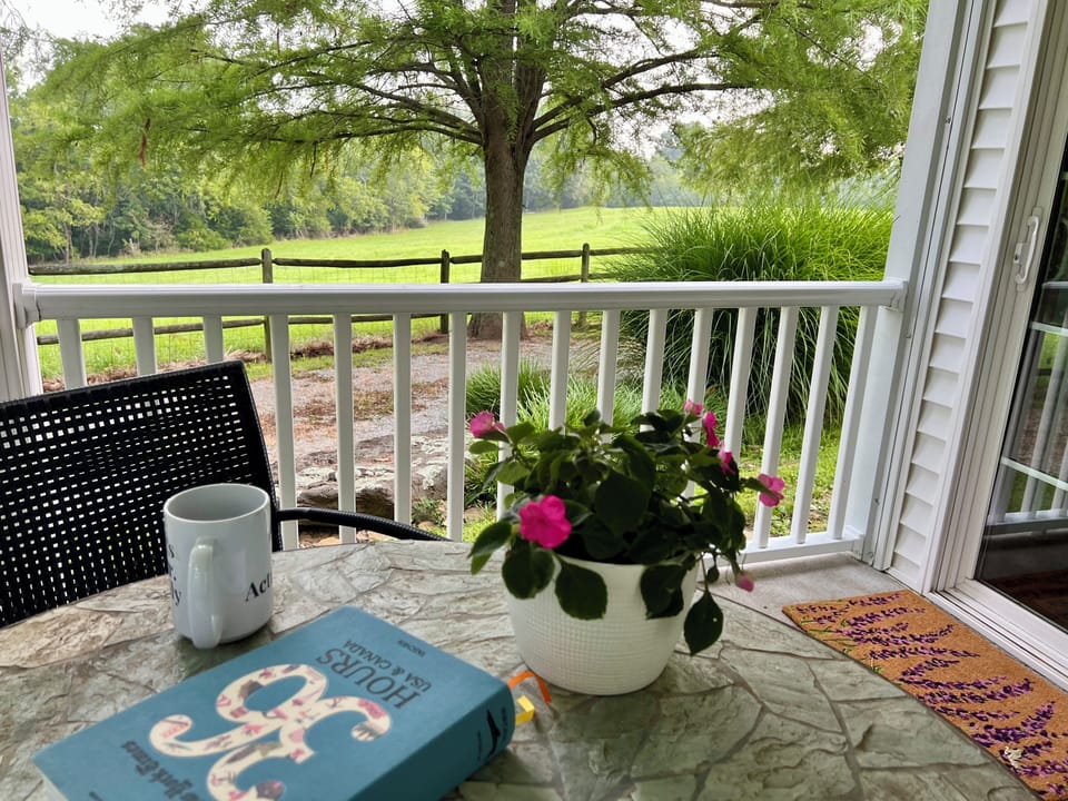 Covered porch to enjoy morning coffee, music, a good book and more