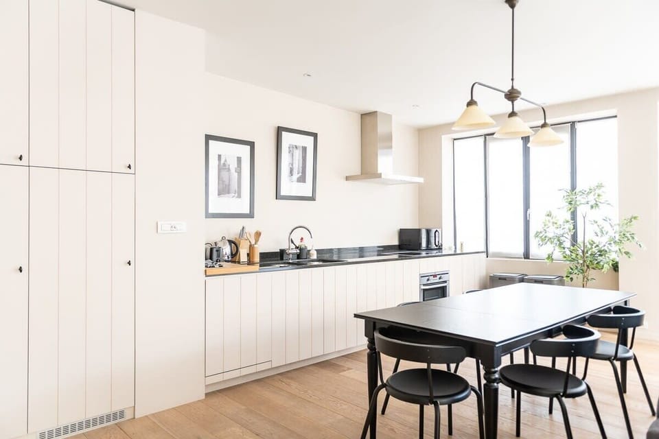 Take a seat at the dining room table to enjoy your feast or use it as a space to complete your work.