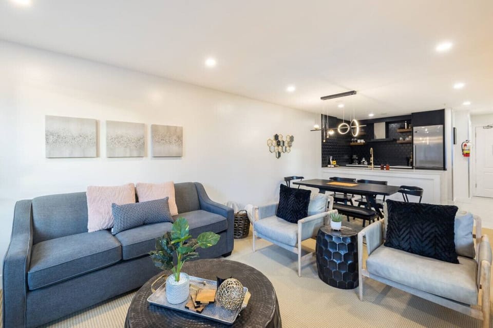 This open concept lay-out makes it easier for guests to interact with each other while some are lounging at the sofa and others are preparing in the kitchen.