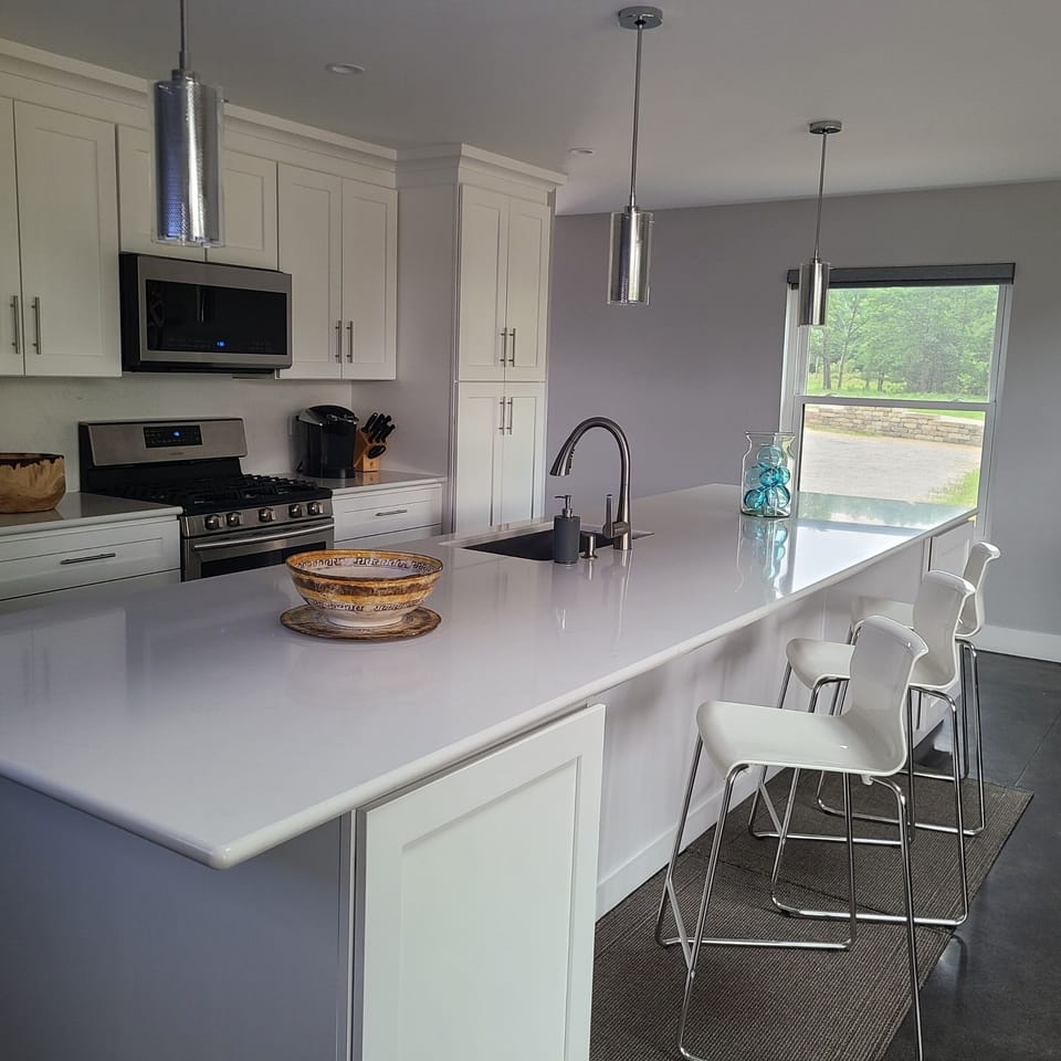 14' island with wine cooler, double pull-out rubbish bins and add'l amenities