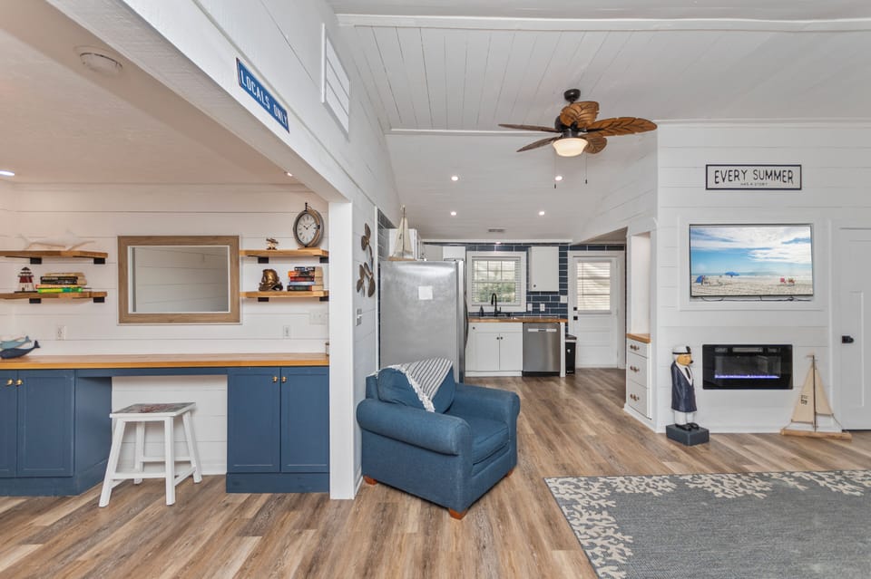 Living area opens into flex space can be used for an office or game area