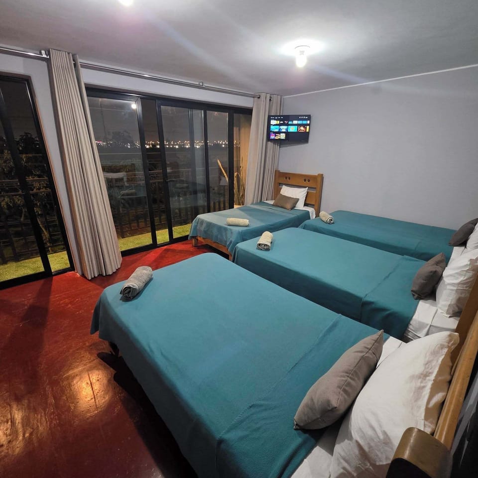 Standard Quadruple Room | Premium bedding, down comforters, pillowtop beds, laptop workspace