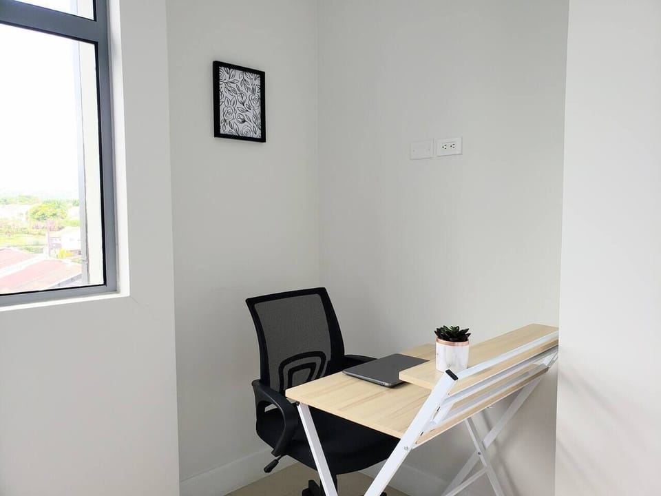 Master Bedroom with Laptop Friendly Workspace Area