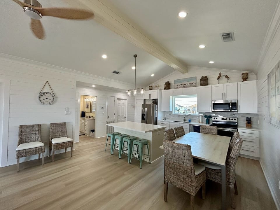 Kitchen, dinning room, master bath and pantry/laundry room in the back ground.