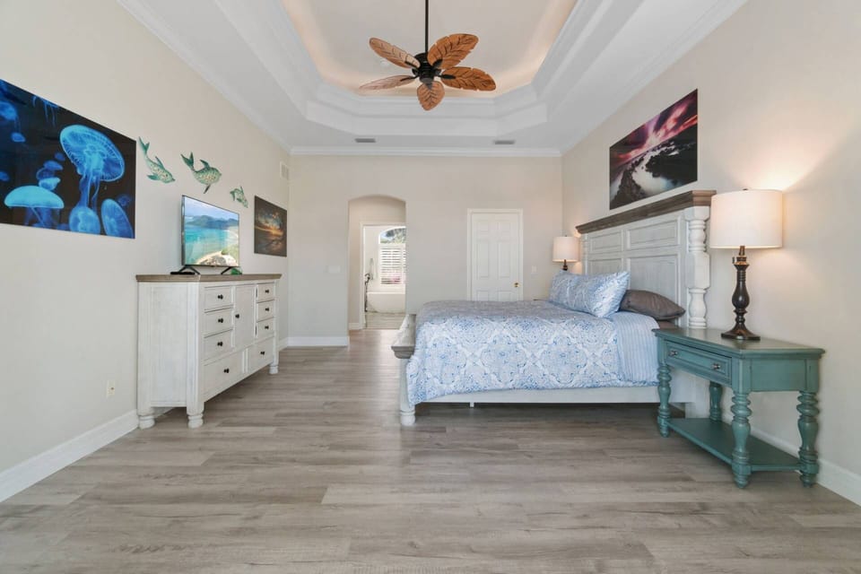 The primary bedroom includes a walk-in closet (closed door) and full ensuite bathroom.