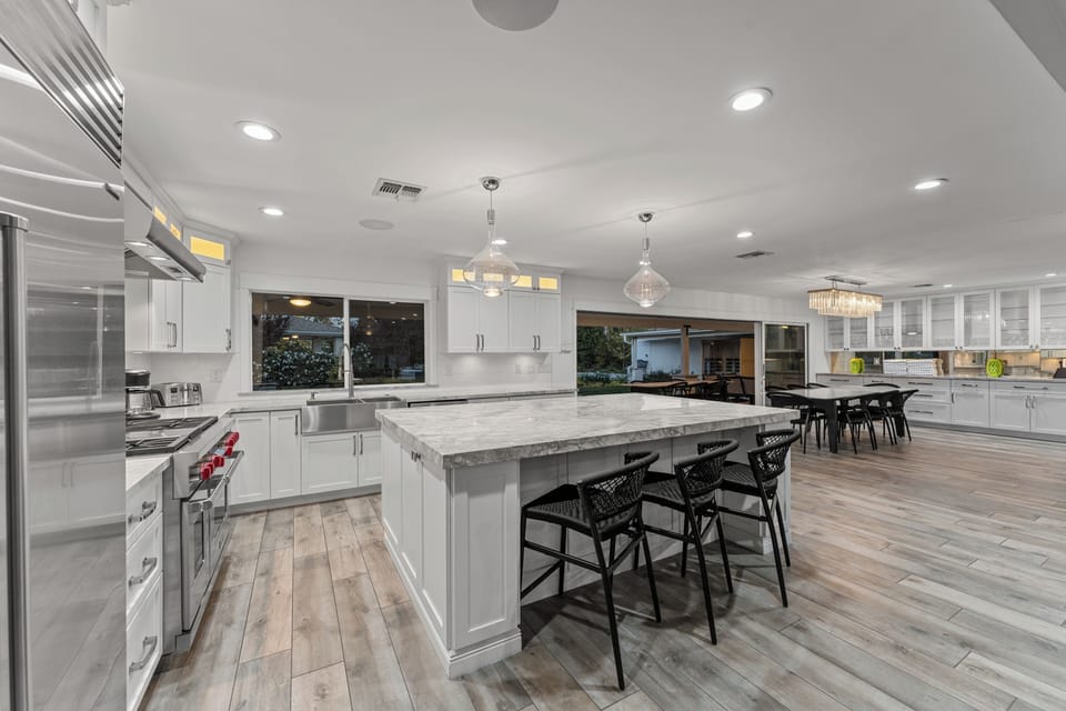 Open kitchen with island & outdoor flow, Arizona entertaining at its best