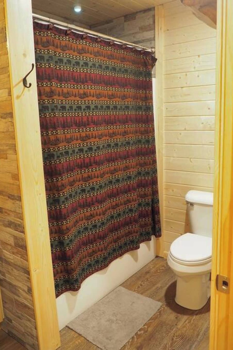 The cabin has a rarity around here: a shower AND tub combo!