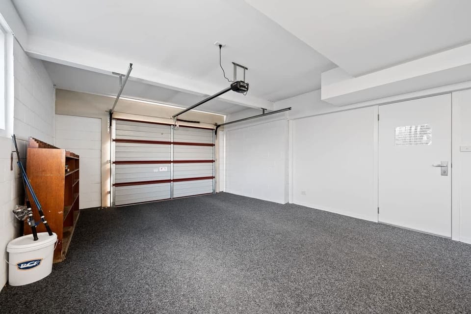 Large garage, fits two small cars.