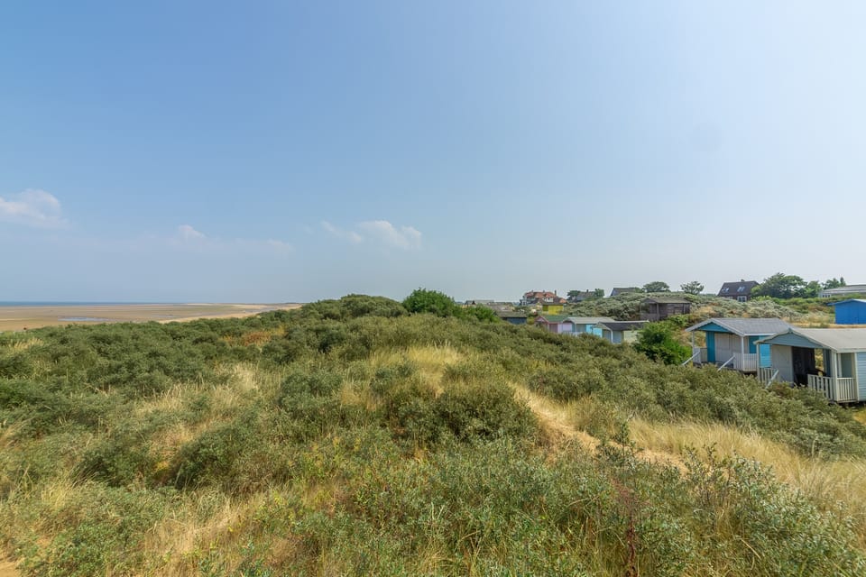 Old Hunstanton beach-huts tucked away in the dunes - perfect for a family day out!