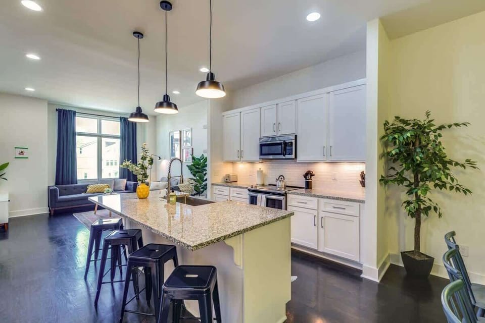 Pull up a seat at the kitchen bar—perfect for casual bites, morning coffee, or keeping the chef company