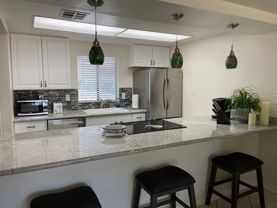 Kitchen is open to the living room- everyone can cook and converse and hang out.