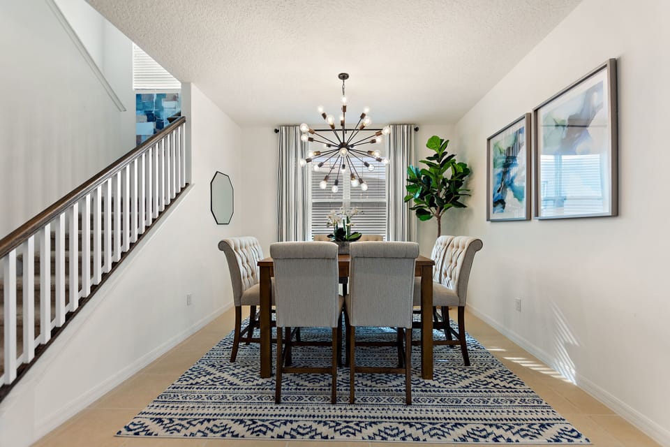 Fully equipped modern kitchen with stainless steel appliances and granite counters