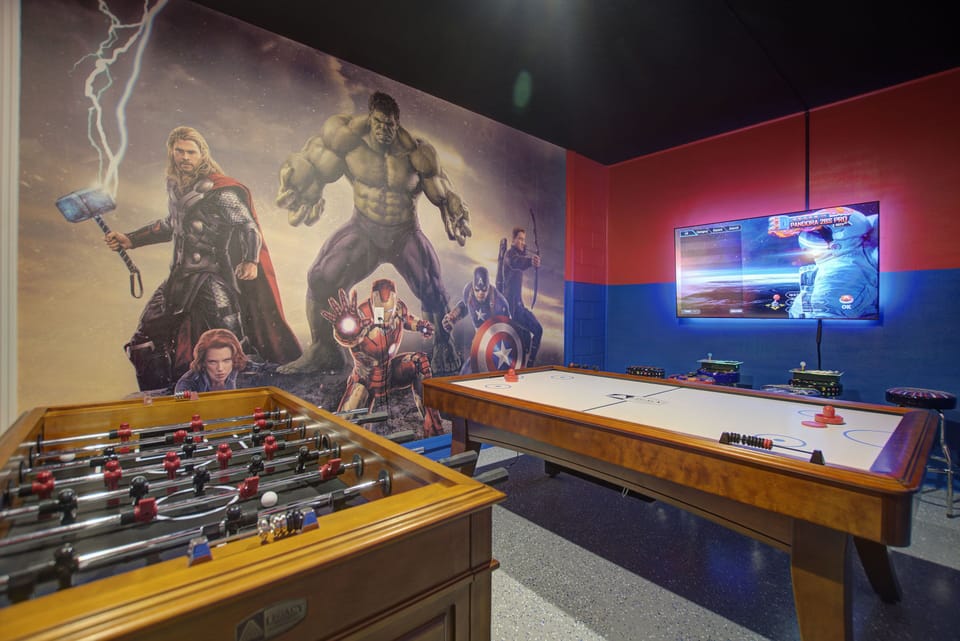 Marvel Avengers-themed air-conditioned arcade with foosball and game tables for family fun