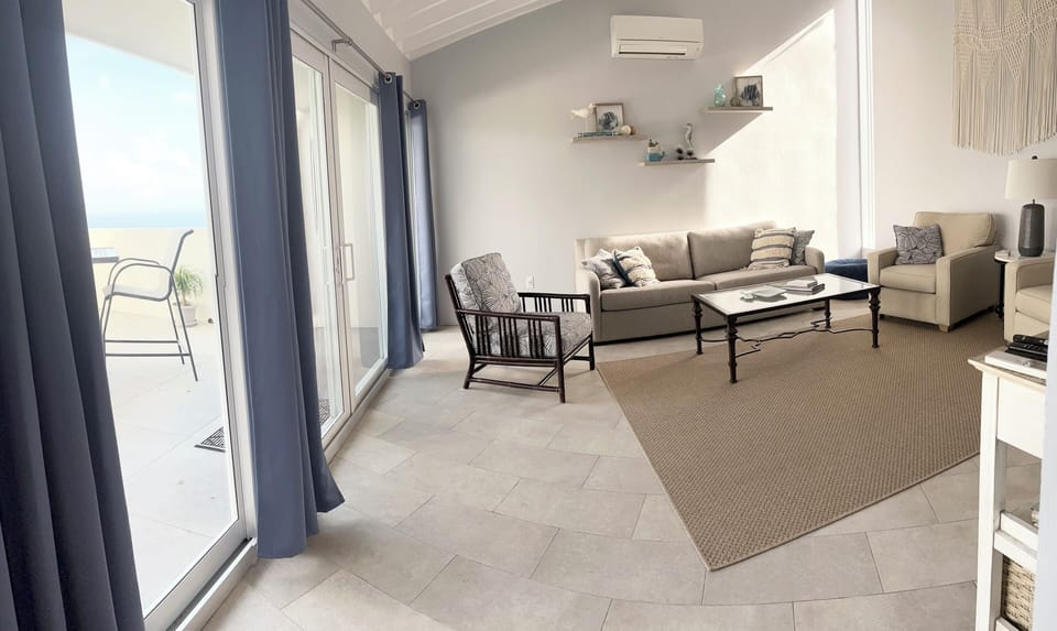 Spacious living area that opens directly to your private balcony.  