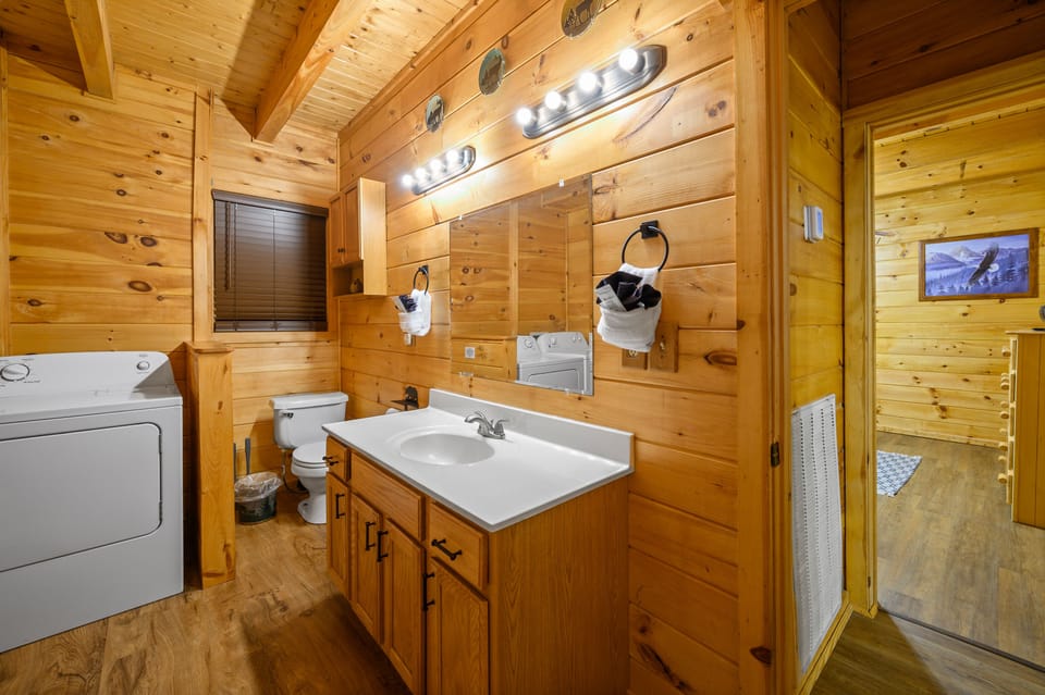 downstairs bathroom with full washer and dryer 
