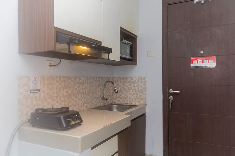 Room | Private kitchen | Fridge, stovetop, electric kettle, cookware/dishes/utensils