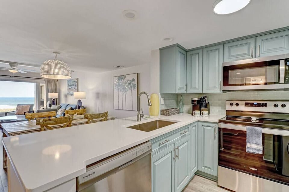 Open kitchen dining floor plan with ocean views