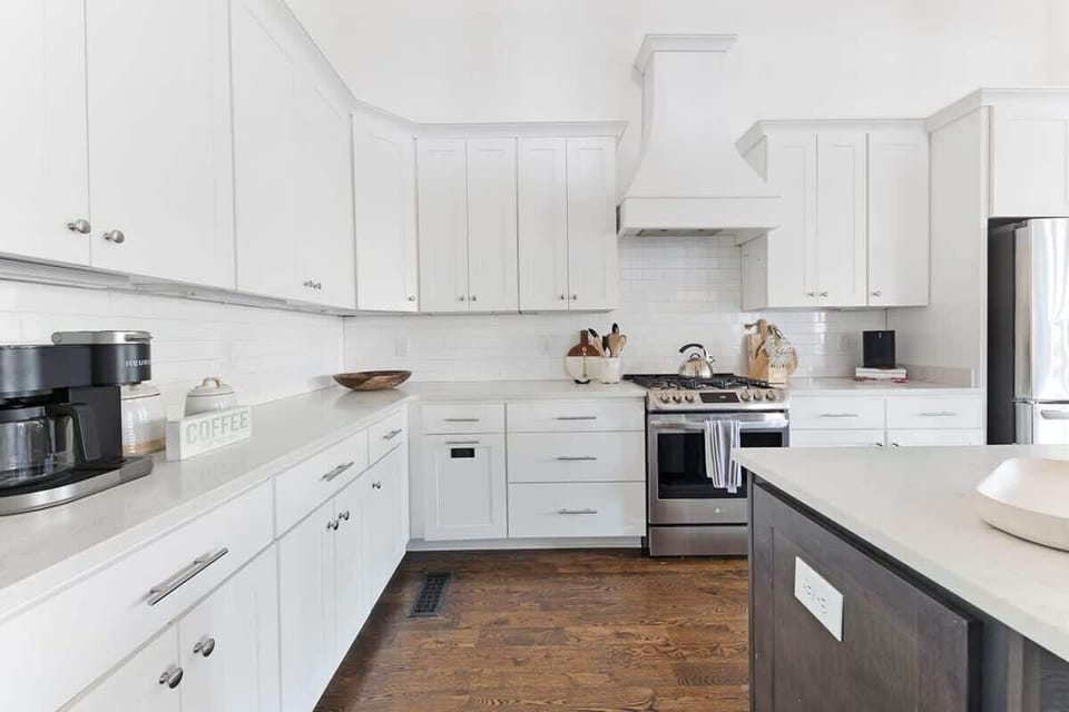 
The kitchen features updated appliances and ample space, making it perfect for everyone to gather and cook together.