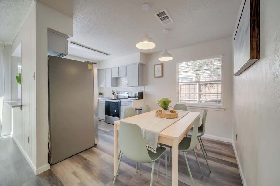 Cozy dining area seamlessly connected to the kitchen, creating an open and inviting space