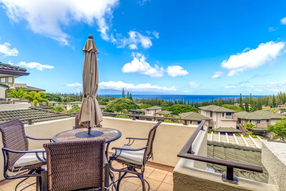 Step into island serenity in this oceanview suite, where lush accents and private lanai access invite peaceful moment    