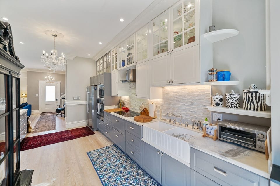 This space boasts a modern and sophisticated kitchen equipped with all types of appliances from blenders to juicers  from a deli slicer to a rice maker. Its there!