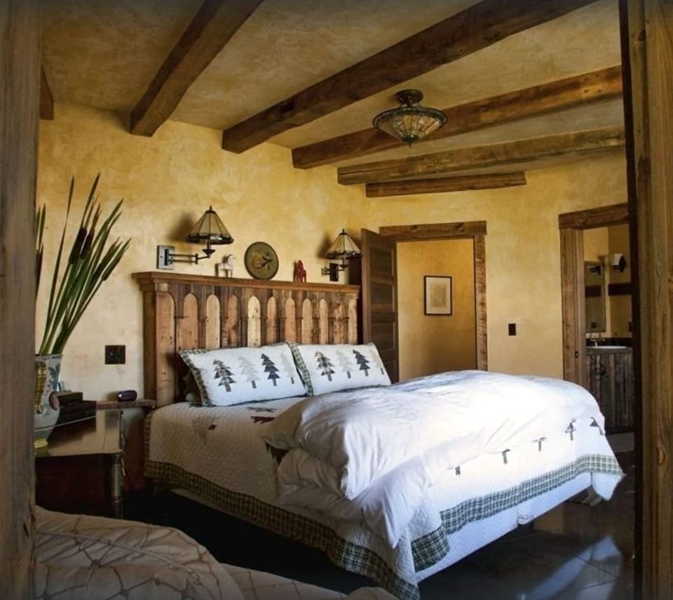 Master bedroom with views to watch the sunrise over the Madison Range 