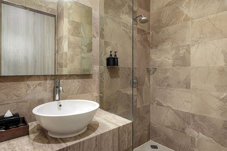 Shower, slippers, towels, soap