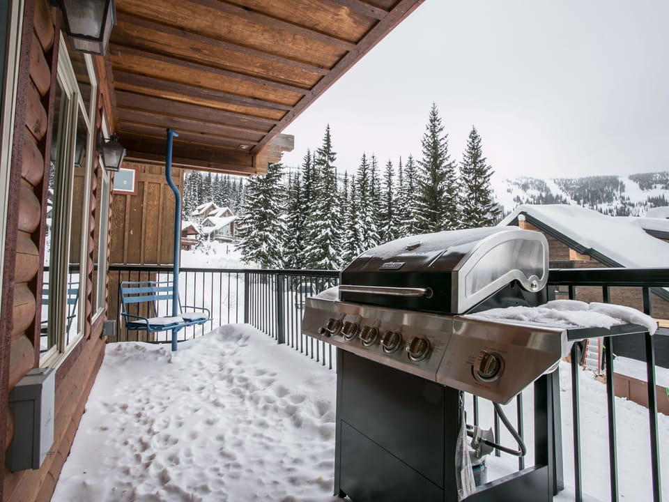 Balcony off the main floor living room/kitchen with Gas grill!