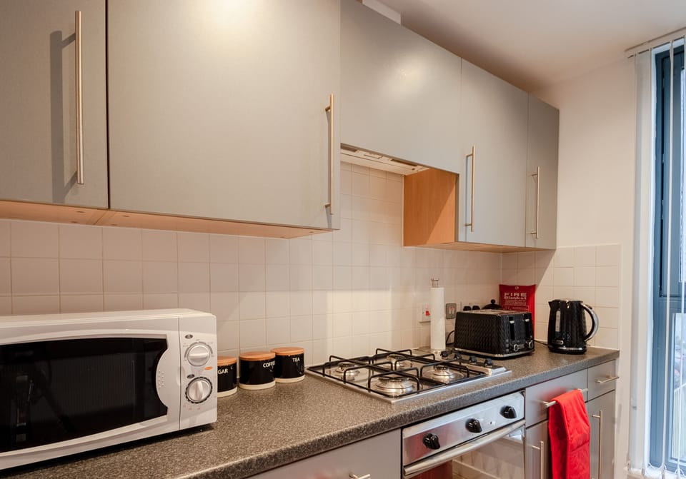 Apartment, 2 Bedrooms, Non Smoking | Private kitchen | Full-size fridge, microwave, oven, coffee/tea maker