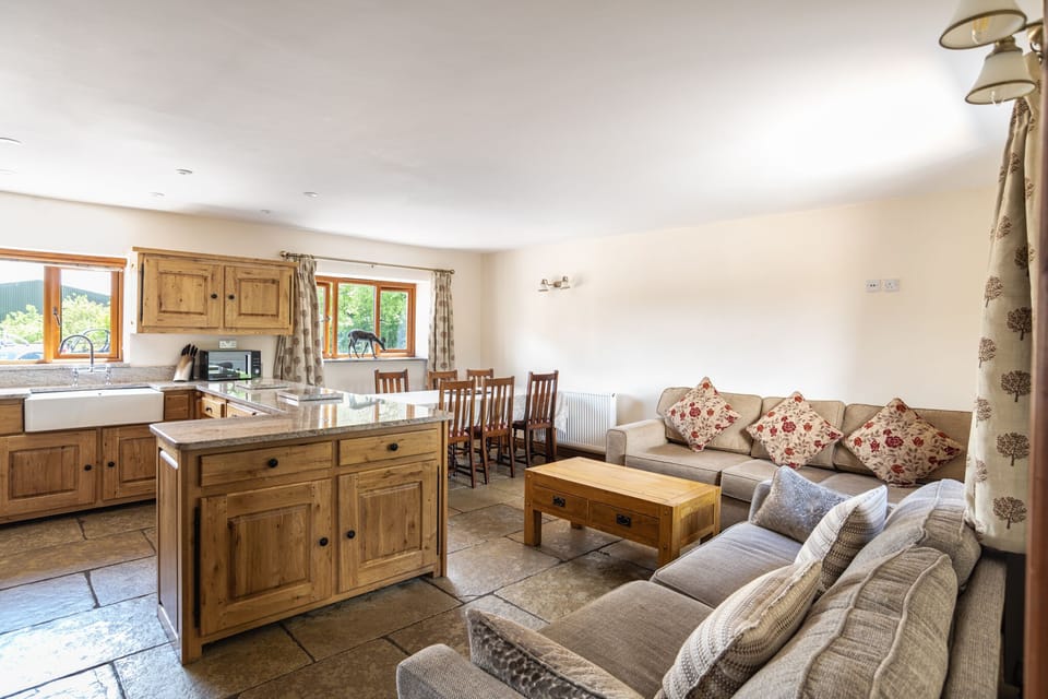 Granary open plan lounge, dining and kitchen room with smart television 
