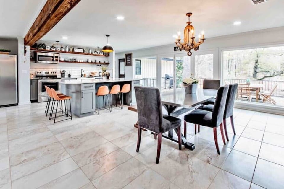 Open concept to enjoy your family & friends! seating and enjoying the lake views