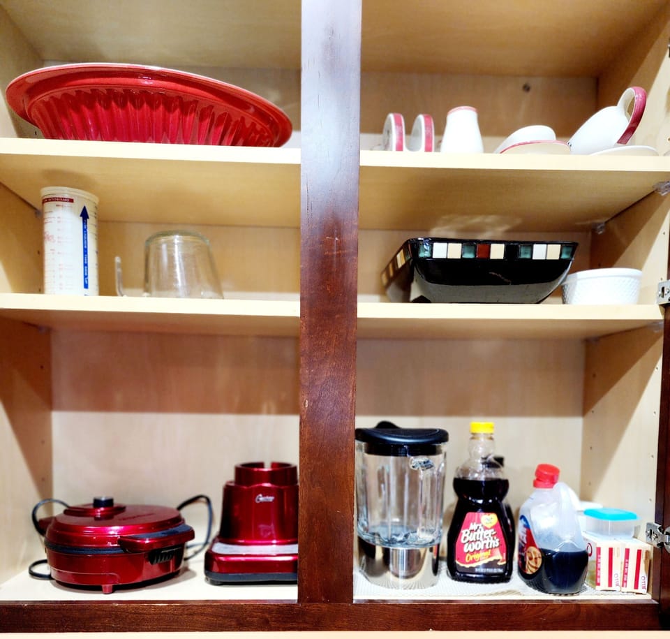 waffle iron, blender and serving dishes