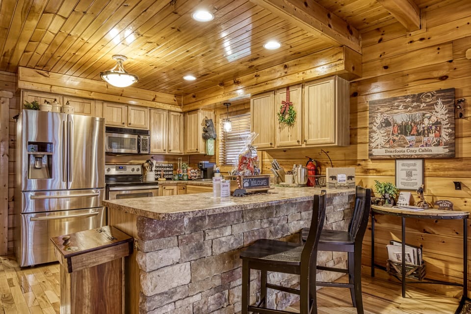 Cabin in the Smokies "Bearfoots Cozy Cabin" - Bar top and kitchen