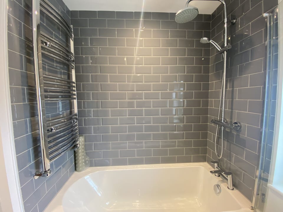 Bathroom - bath with shower 