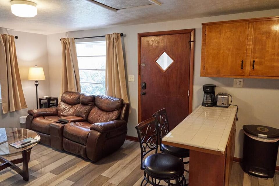 Open concept living area. Kitchen, living, and dining room all in same area.