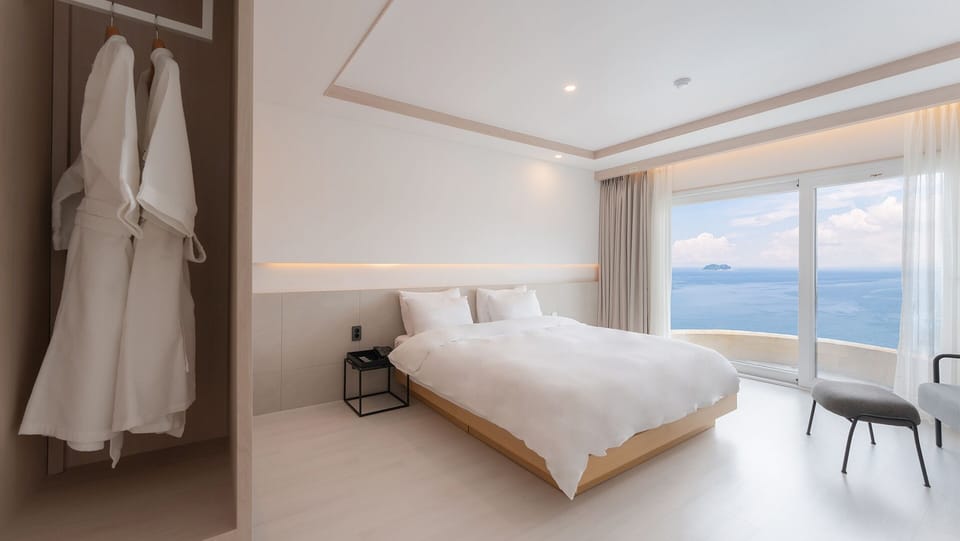Premium Room, Ocean View | Premium bedding, blackout drapes, free WiFi, bed sheets