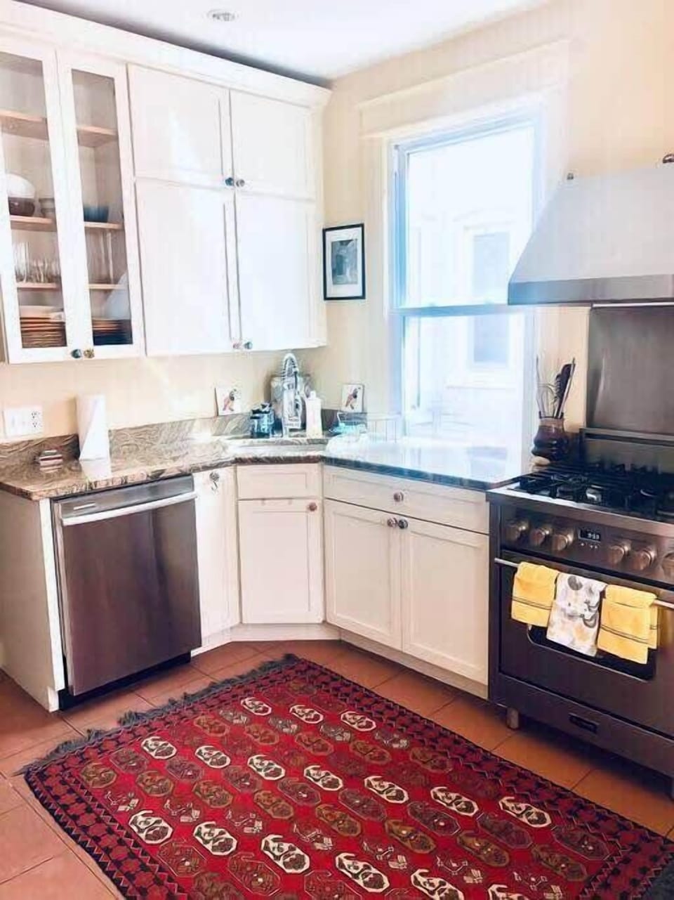 Open concept kitchen with gas range
