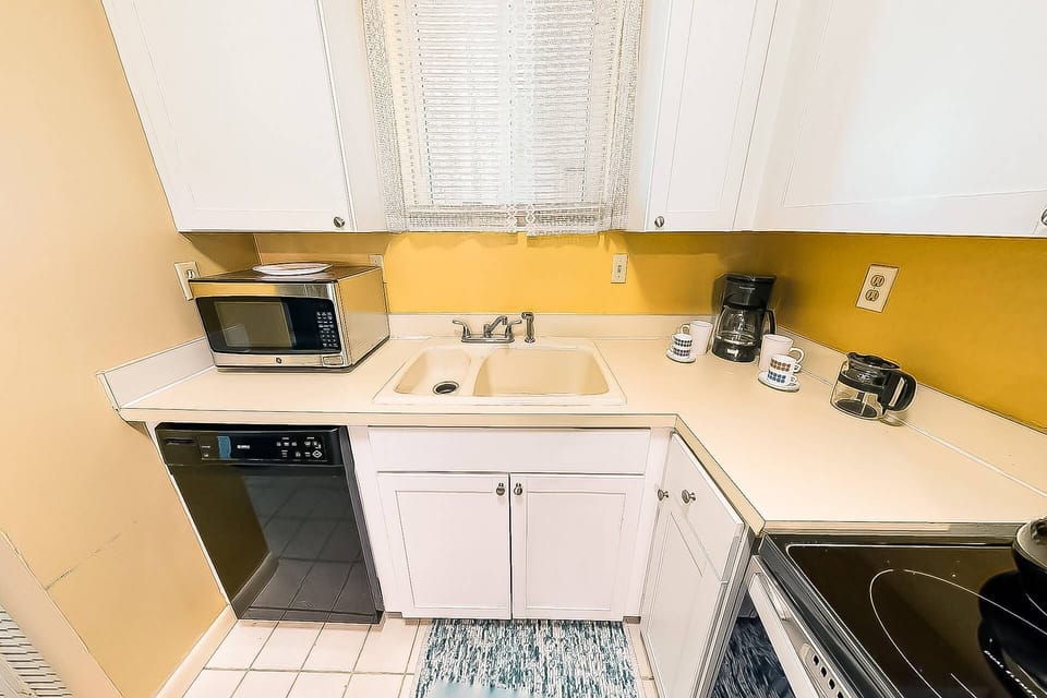 Full size kitchen with newer cabinets and brand new stainless oven and French door style refrigerator.