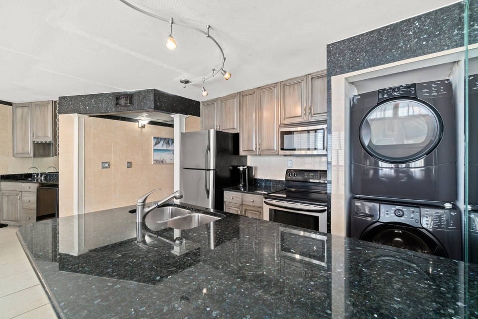 Updated kitchen with washer and dryer