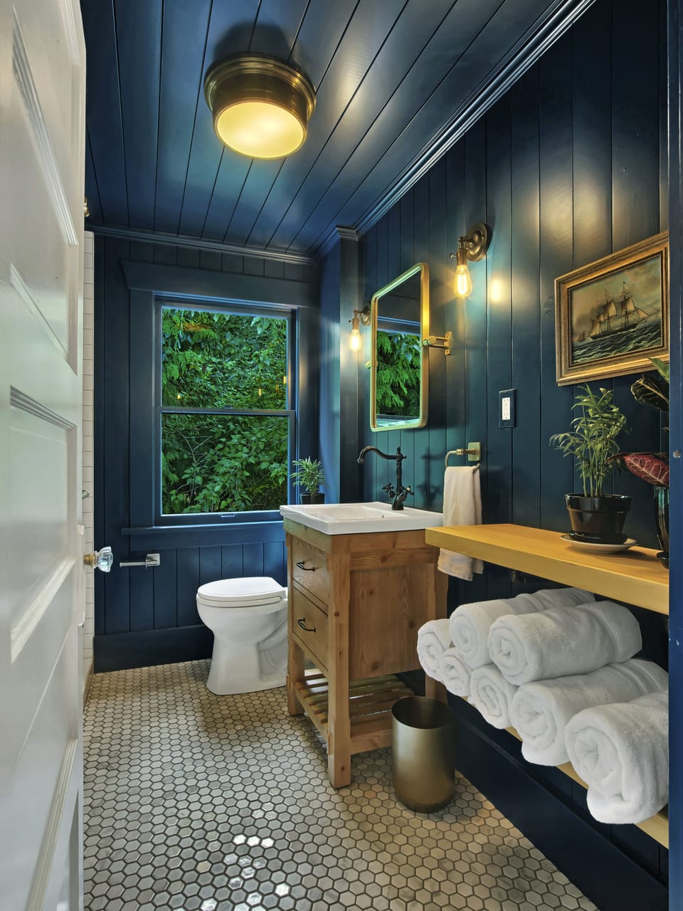 Bathroom upstairs with a shower.
