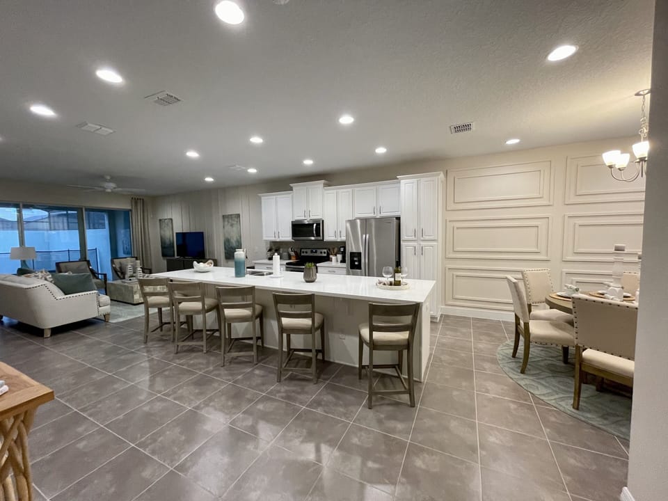 Spacious open concept living for guests with plenty of room for everyone.