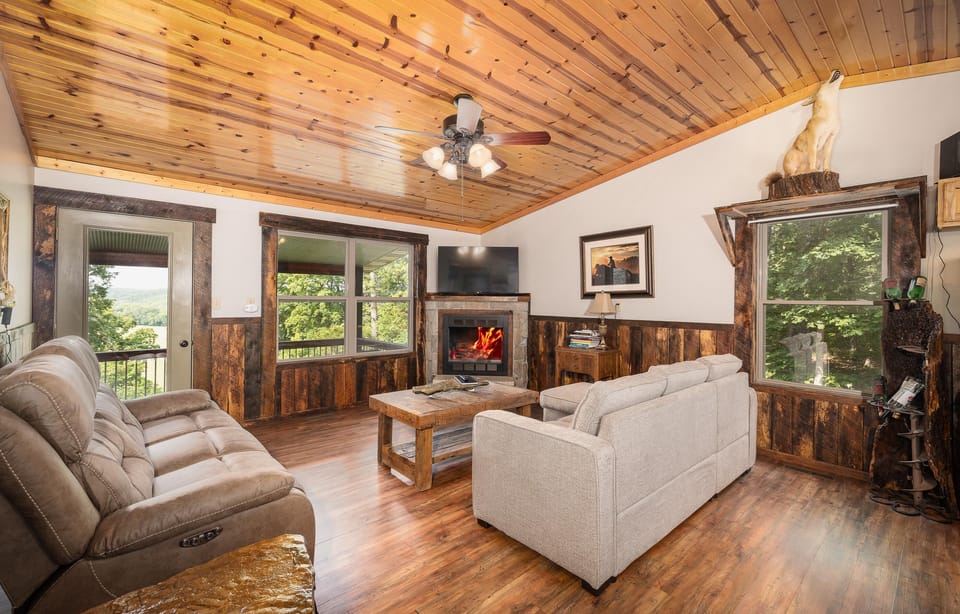 Living Room, Gas Fireplace, Couch with 2 recliners, couch with sofa bed.