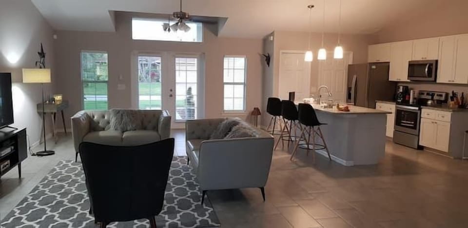Living room with easy access to kitchen