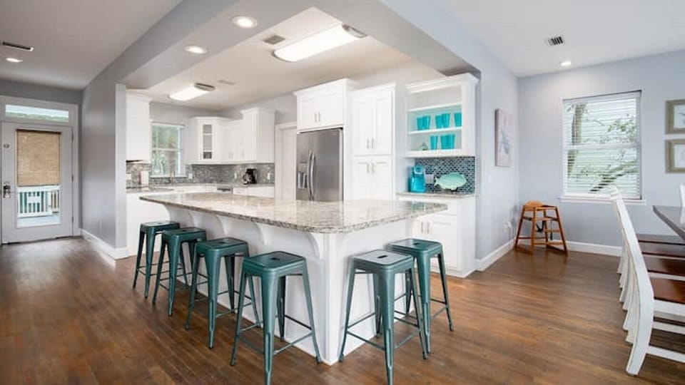 Fully equipped kitchen with stainless steel appliances and granite counter tops