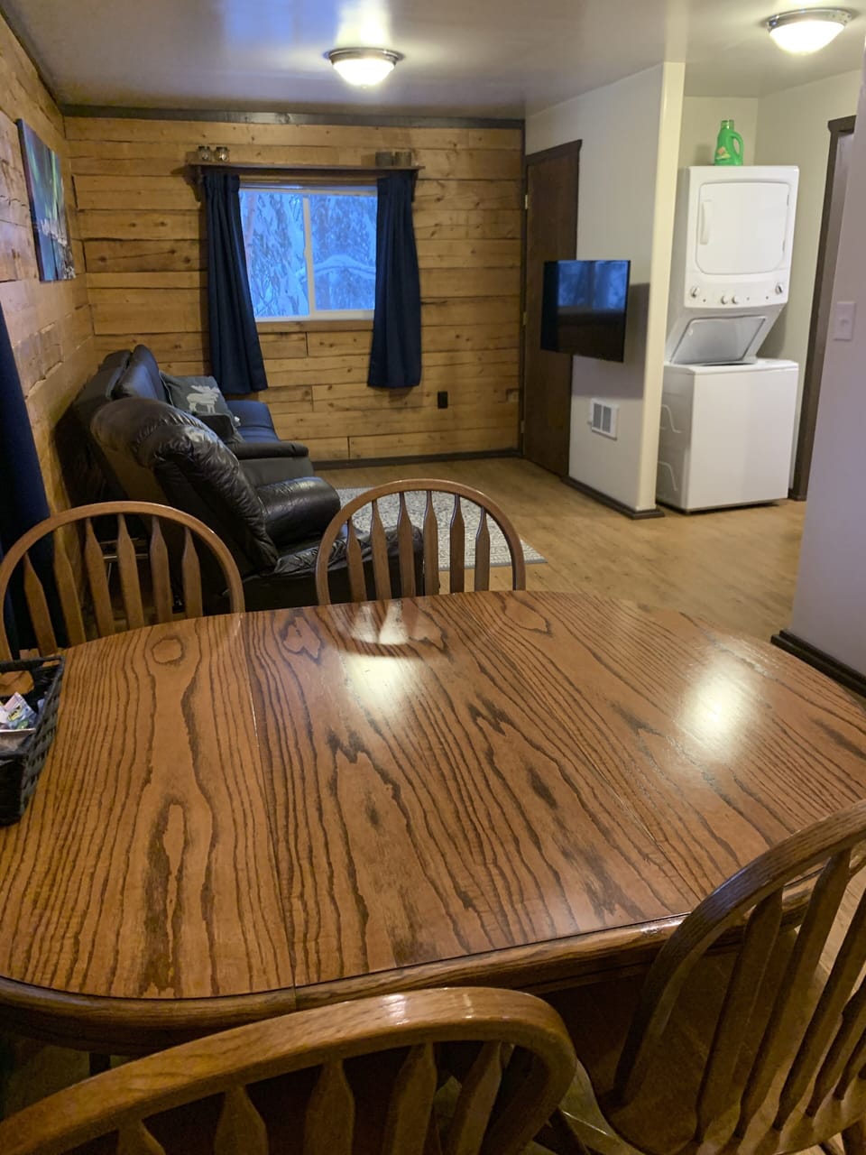Dinging room, living room (sofa can be made into a bed), and washer/dryer